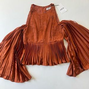 Brand new. With tags. Never worn.